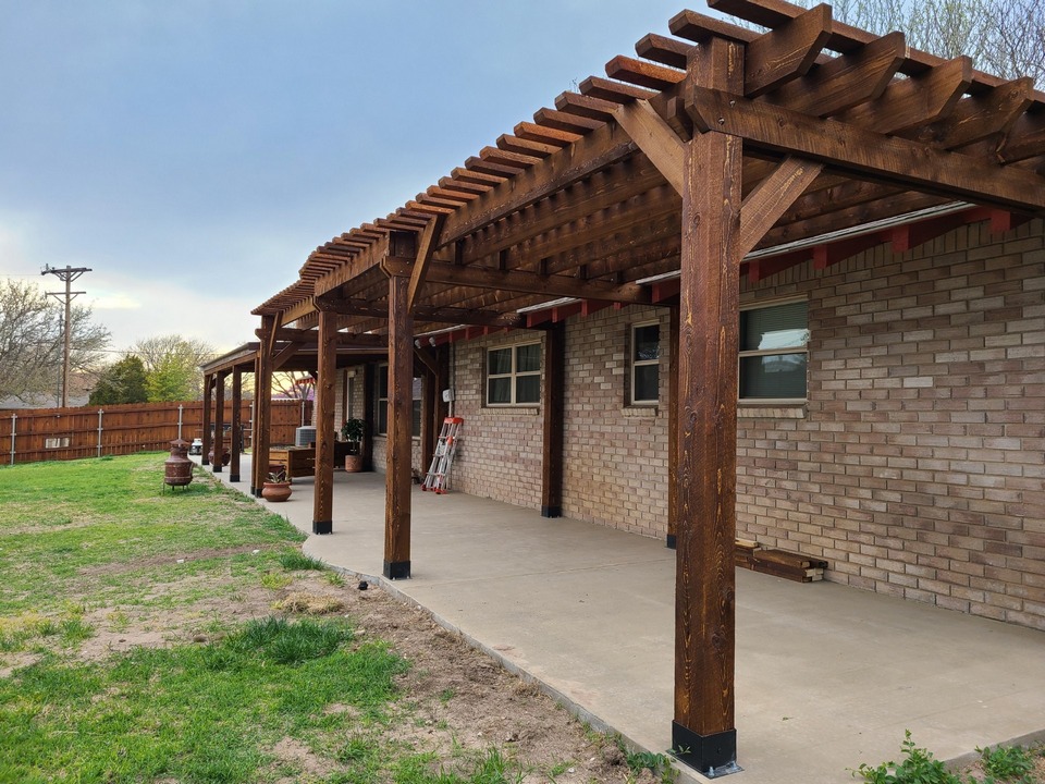 porch shade structure made from rough cut lumber